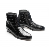 zipped boot in black embossed calf